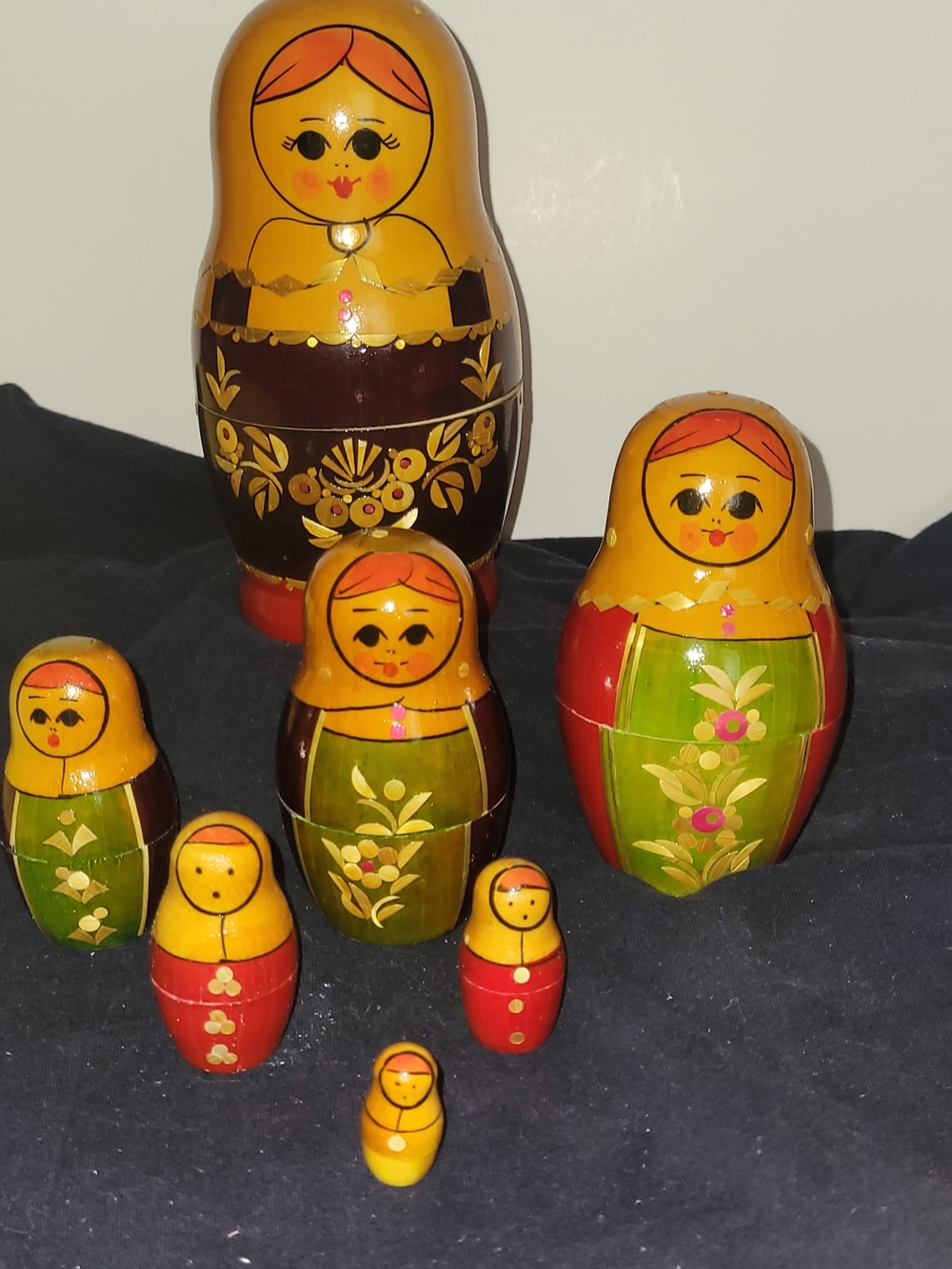 Vintage Hand-Painted Matryoshka Nesting Dolls - 7 Set Medium Doll Has Back Crack